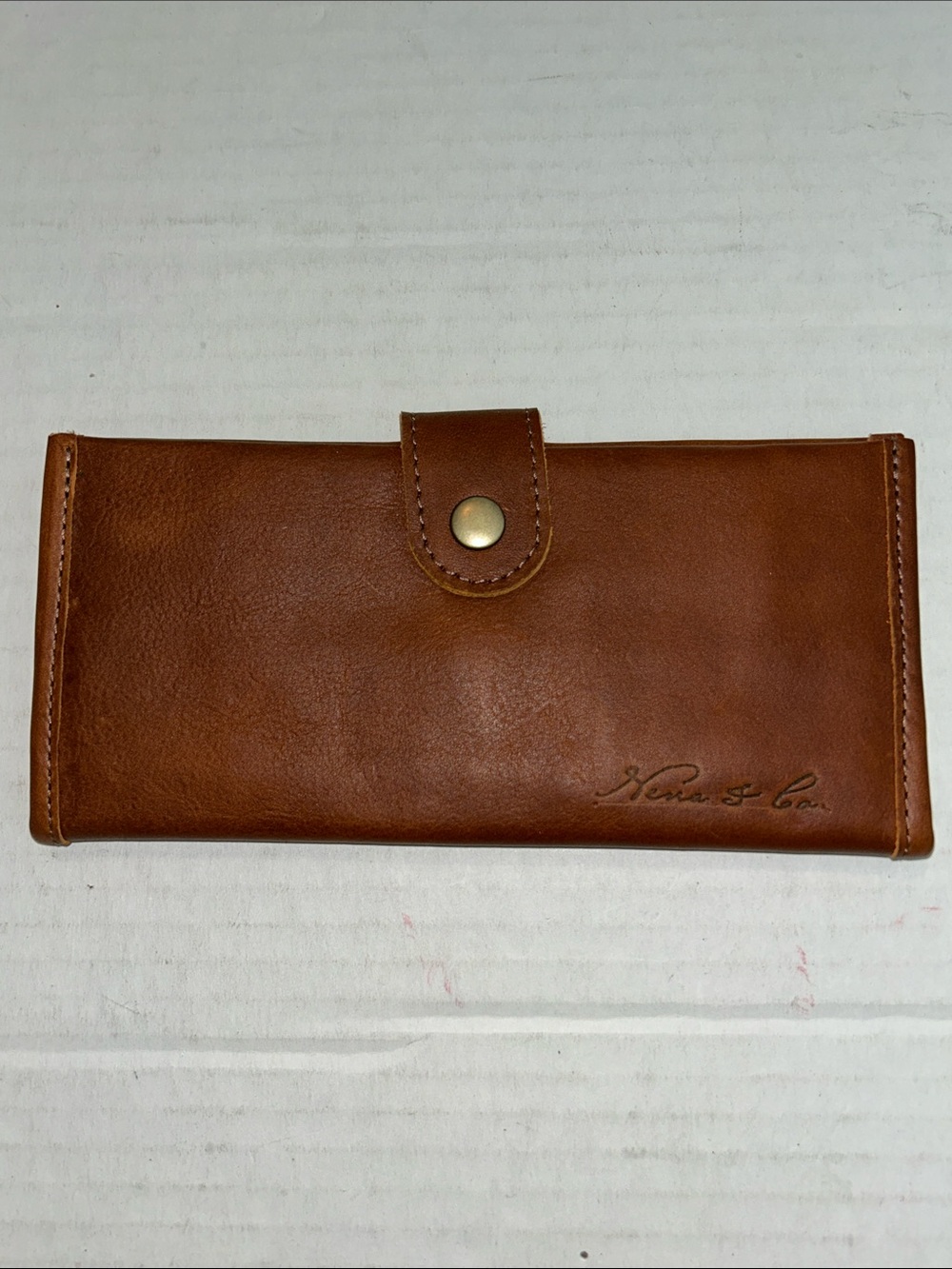 Nena & Co. brown leather bifold snap wallet